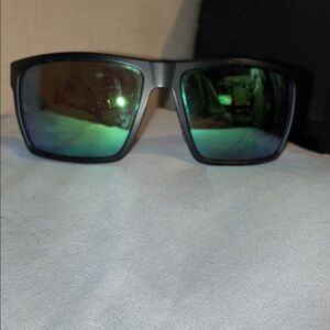 Black Sunglasses with Green Lenses